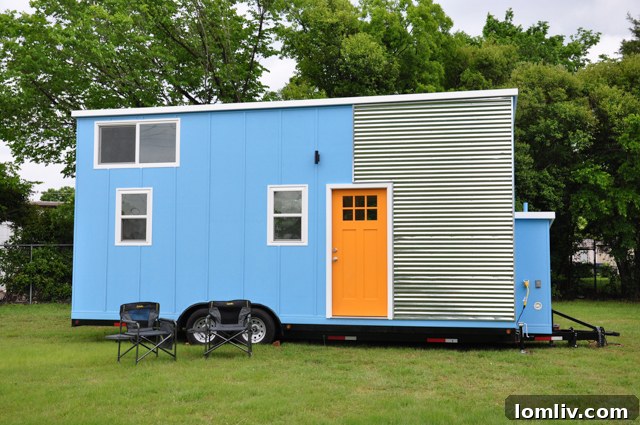 Indigo River Tiny Homes' Baby Blue model, a 24-foot minimalist tiny home on wheels