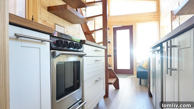 The compact and functional kitchen in an Indigo River Tiny Home