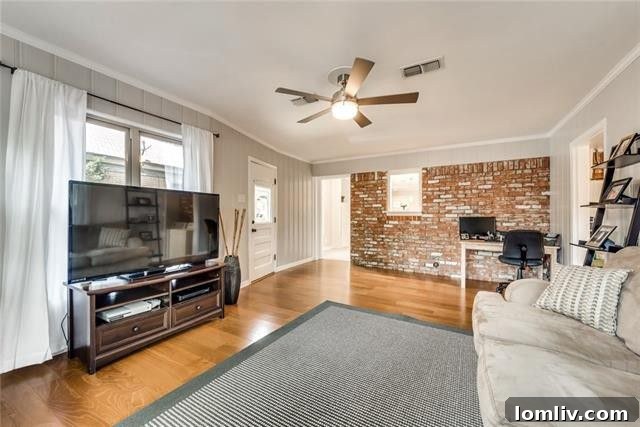 Inviting view of the private backyard, highlighting the towering mature trees and the sturdy wood privacy fence
