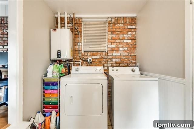 Detailed shot of the luxurious granite countertops and classic subway tile backsplash in the beautifully updated kitchen