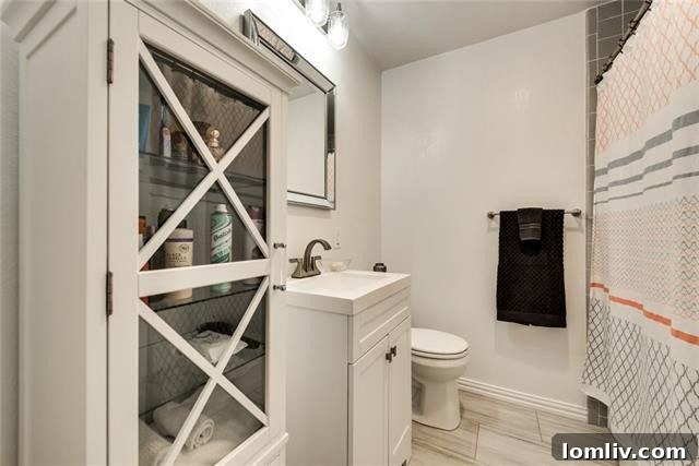 Master bathroom with modern fixtures, a contemporary vanity, and a spacious walk-in shower, offering a spa-like feel
