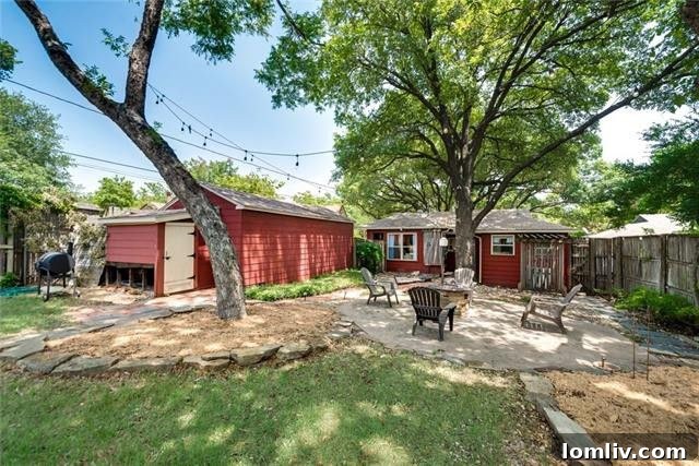 Side view of the property, showcasing the well-maintained grounds, the classic brick exterior, and the sense of privacy