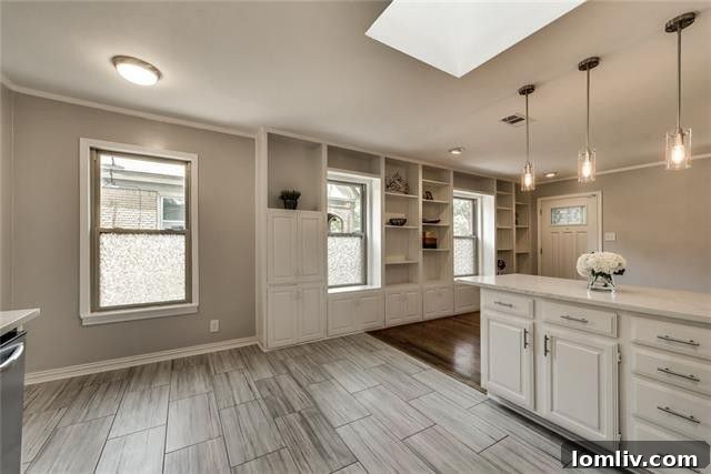 Updated main bathroom with a contemporary vanity, sleek fixtures, and a clean, modern design in 617 Cliffdale Avenue