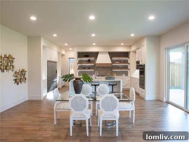 Modern kitchen with floating shelves and integrated lighting
