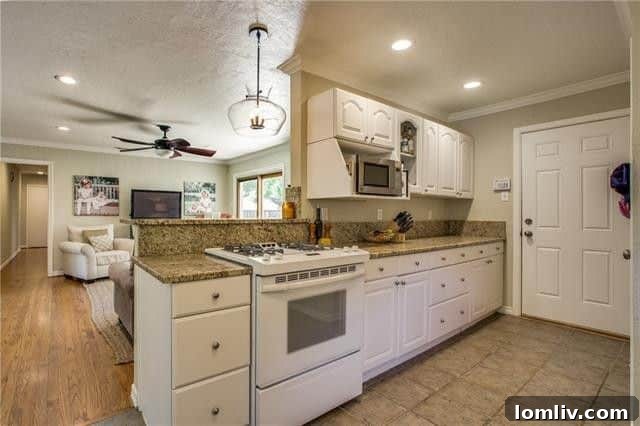 Kitchen view showing gas range and ample counter space