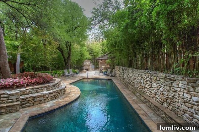 Luxurious outdoor amenities including a lap pool, hot tub, and bar area, set within the stunning gardens of 208 Rockwood Drive.