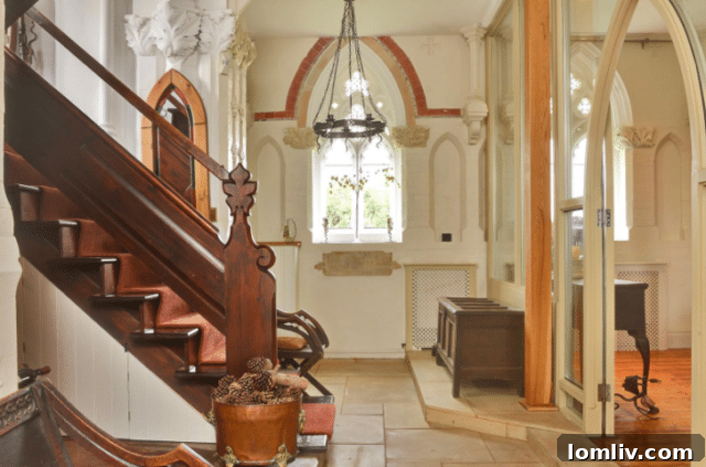 Modern open-plan living space with high ceilings and historical features in the converted Cold Hanworth church