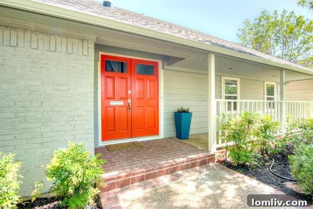 Two Lochwood Homes: A Splurge and a Steal, Both with New Lower Prices 3 Stylish living room with high ceilings and fireplace at 10542 Wyatt Street