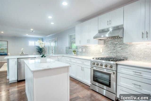 Two Lochwood Homes: A Splurge and a Steal, Both with New Lower Prices 5 Luxurious master bathroom with soaking tub and walk-in shower at 10542 Wyatt Street