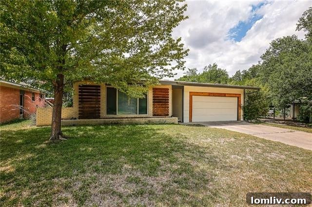 Two Lochwood Homes: A Splurge and a Steal, Both with New Lower Prices 8 Modern exterior view of 11635 Cimarec Street, a greenbelt property in Lochwood