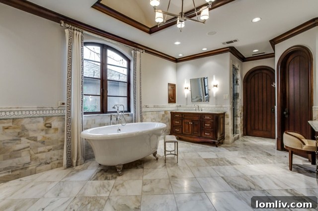 Clawfoot soaking tub taking center stage in the master bathroom