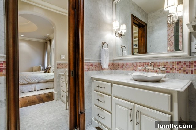 Guest room featuring an ensuite bathroom and vanity area