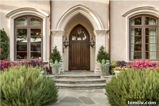 Arched front door of the University Park estate, showcasing Old World architectural details
