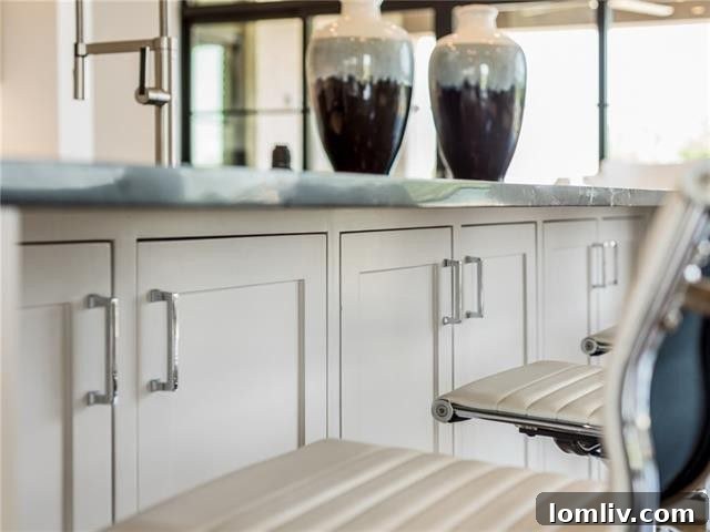 Elegant Kitchen Island with Seating and Modern Fixtures