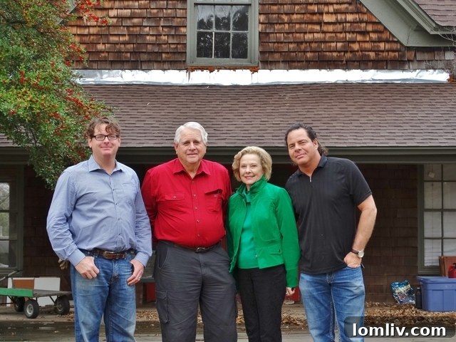 Clint Haggard with family members at the Collinwood House, highlighting their deep historical connection to the property.