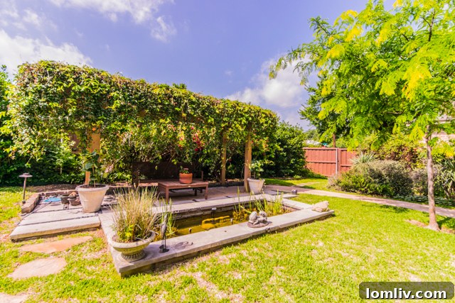 Peaceful private backyard with reflection pond and covered seating areas
