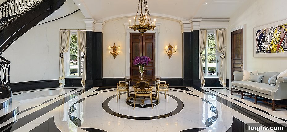 Elegant formal dining room set for twenty guests, adorned with classic furnishings