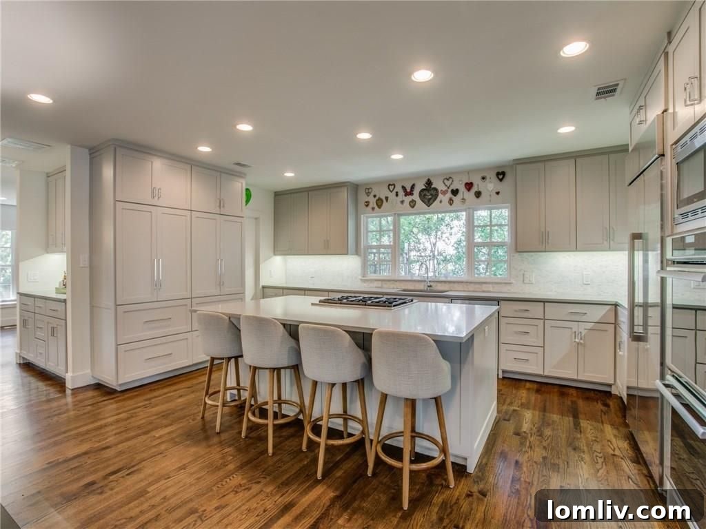 Modern Gourmet Kitchen with Island and Stainless Steel Appliances