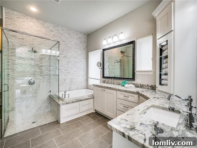 Luxurious master bath with soaking tub and frameless glass shower