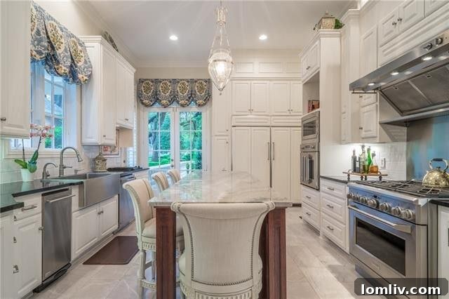 Gourmet kitchen with stainless steel appliances and large island