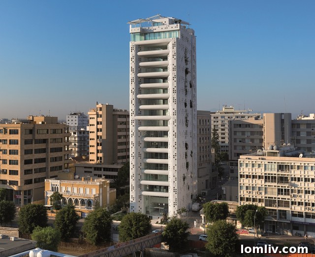 Tour 25 - White Walls, Nicosia, Cyprus - a building with vibrant greenery