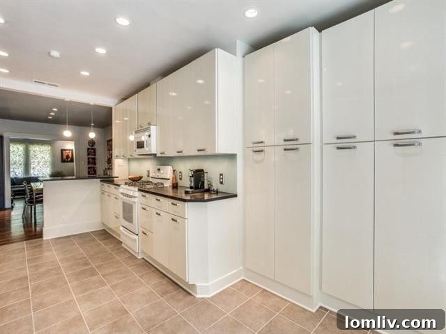 Modern kitchen with black countertops at 113 S. Clinton Ave