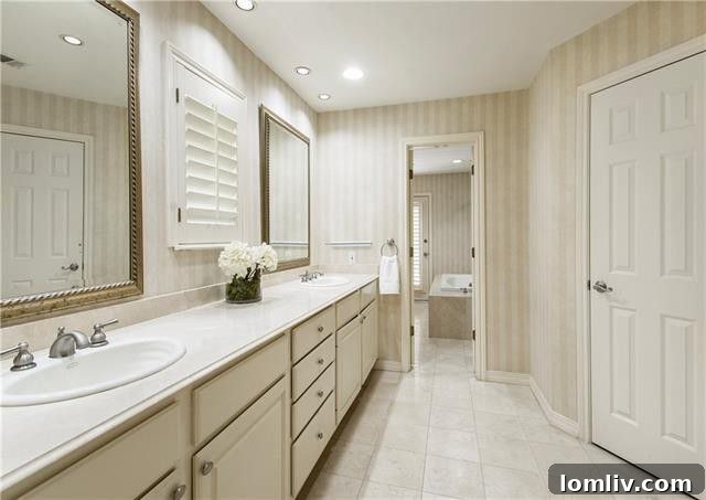 Another view of a well-appointed bathroom in the Branch Oaks Circle home