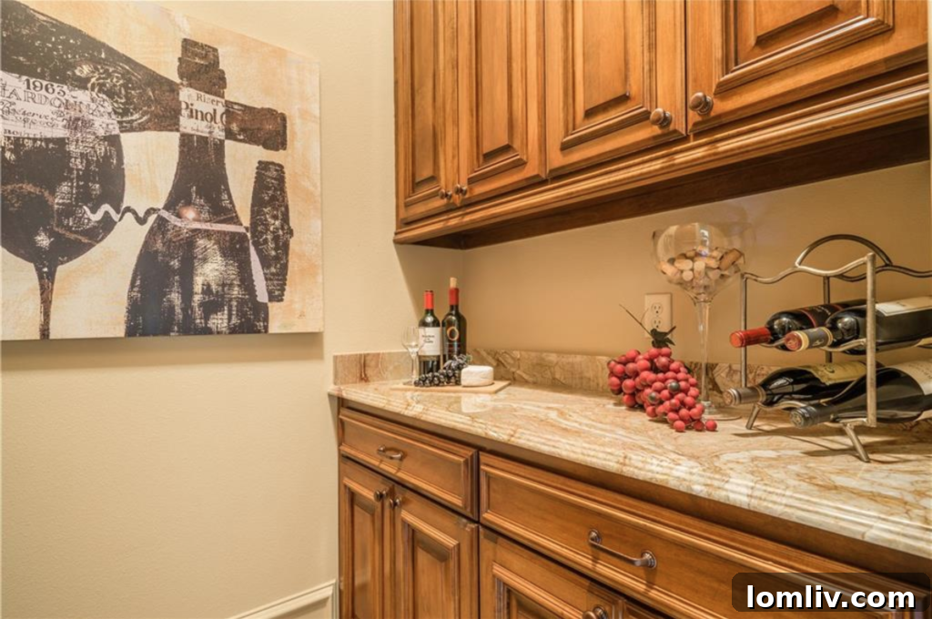 The butler’s pantry boasts an impressive amount of built-in storage space, perfect for organization and entertaining needs.