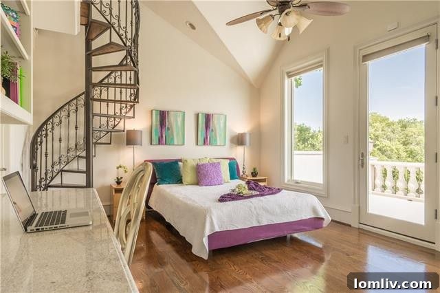 One of three distinctive secondary bedrooms, featuring a built-in desk, a generous walk-in closet, a full private bath, and direct access to a private terrace. A charming spiral staircase leads to an upper loft that connects to other bedrooms, also providing a secluded passageway to a private reading nook or overlook.