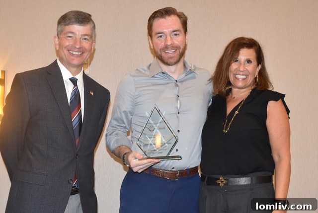 Ben Lauer of Lauer Real Estate Group receiving Live Local Award