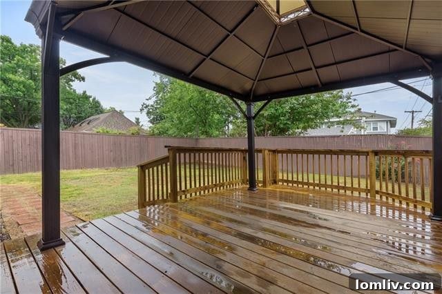 Backyard with Pergola and Fenced Lawn