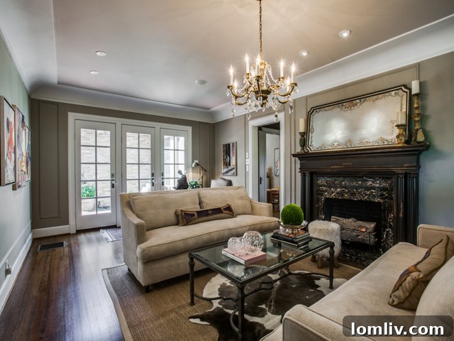 Elegant staircase with ornate banister and restored details at 5901 Swiss Avenue