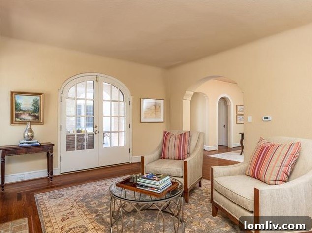 Elegant Hallway with Arched Openings in Historic Fort Worth Property