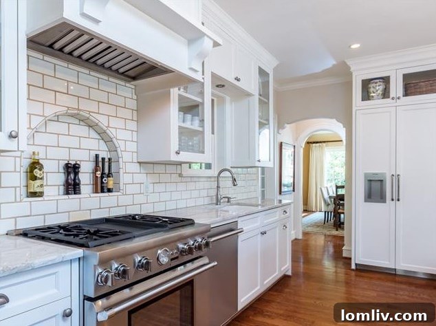 Gourmet Kitchen with Large Quartz Island and Wine Fridge