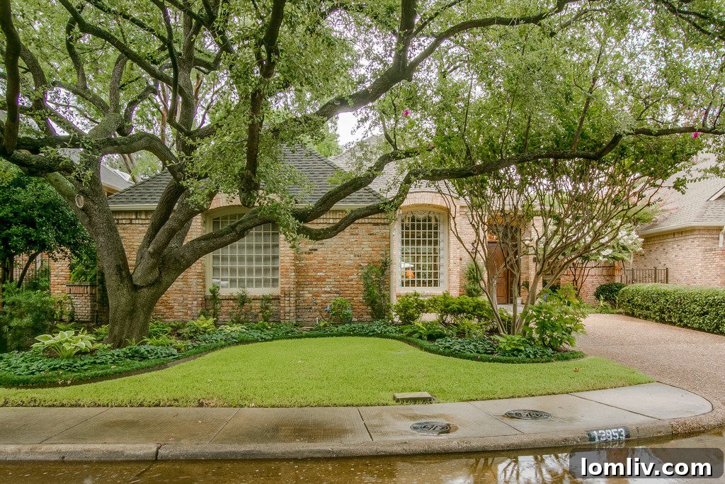 Charming two-story traditional home at 13853 Creekside Place with lush landscaping