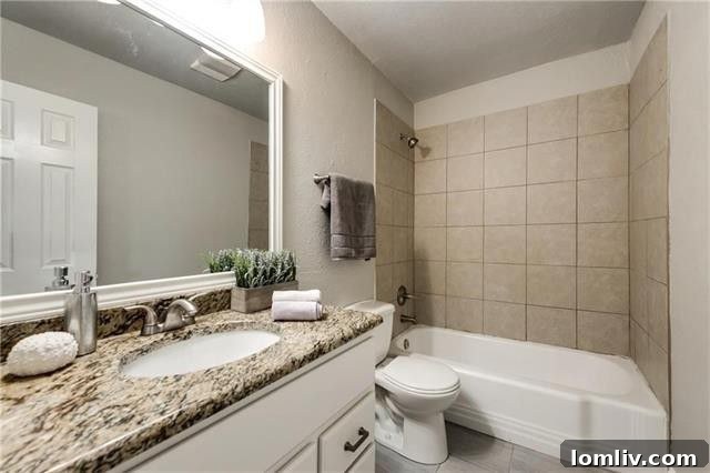 Laundry area within one of the master bathrooms