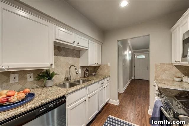 Modern kitchen with granite countertops and stainless steel appliances