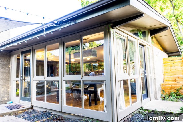 Another view of the home's exterior and landscaped garden