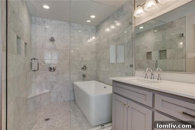 Luxurious master bathroom with deep soaking tub and stylish fixtures