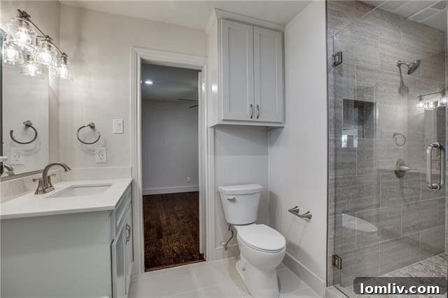 Close-up of the elegant gray Shaker-style cabinets in the master bathroom