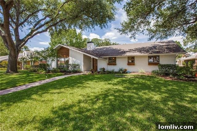Lush, private backyard of the midcentury modern home, ideal for relaxation
