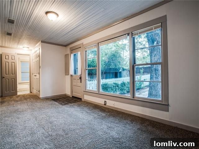 Diane Sherman Unveils Historic Winnetka Heights Craftsman Priced at 449000 10 Spacious Living Area with Bead-Board Ceiling and Built-ins