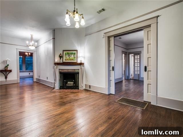 Diane Sherman Unveils Historic Winnetka Heights Craftsman Priced at 449000 8 Original Brass Light Fixture and Woodwork in a Craftsman Home