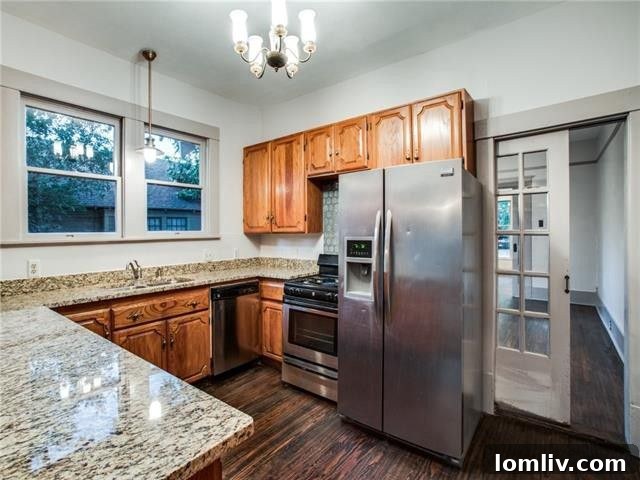 Diane Sherman Unveils Historic Winnetka Heights Craftsman Priced at 449000 9 Modern Kitchen with Granite and Stainless Steel in Historic Dallas Home