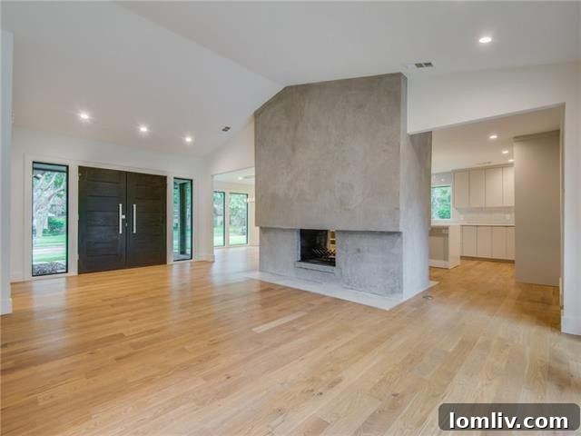 Dallas Open House Gems Await Your Discovery This Weekend 9 Inviting living space with fireplace and large windows at 3911 Antigua Drive