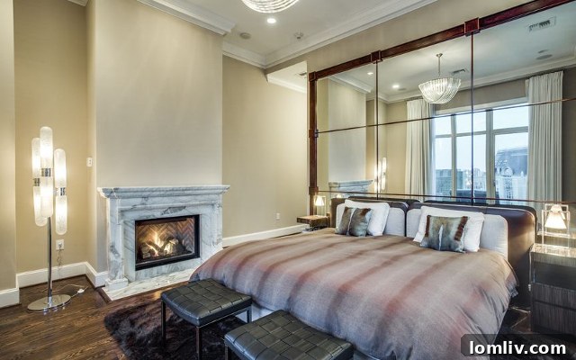 Light-Filled Master Bedroom with Fireplace in Dallas Luxury Condo