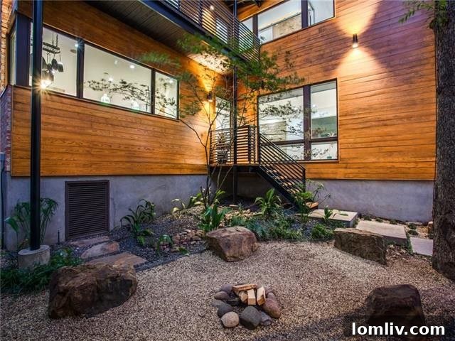 Elegant landscaping and mature trees frame the Wildgrove Ave property