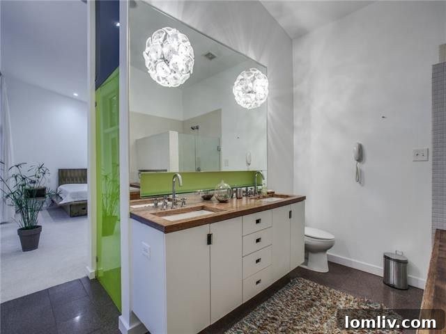 Master bathroom with Japanese soaking tub and green accents
