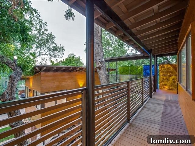The impressive steel catwalk connecting the main house to the studio