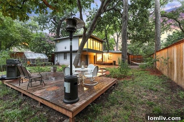 Treetop Midcentury Gem in Eastwood Estates: Incredible Value at $450K 16 Wooden Deck, Greenhouse, and Hammock in Backyard Oasis